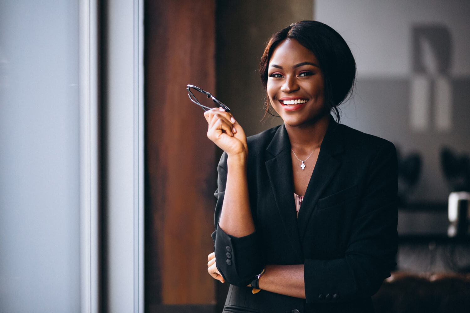 african-american-business-woman-by-window (1)